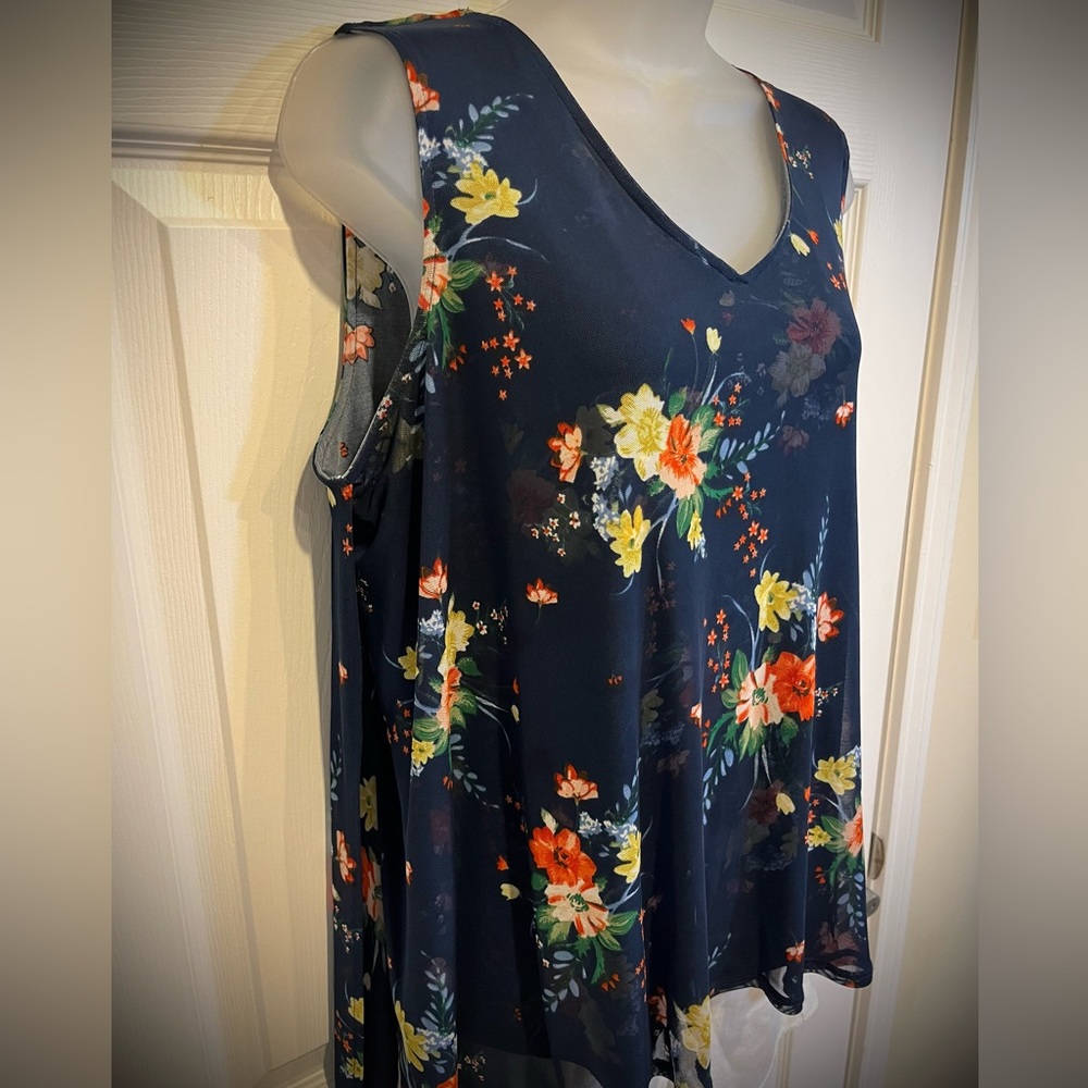 Floral sleeveless flyaway top